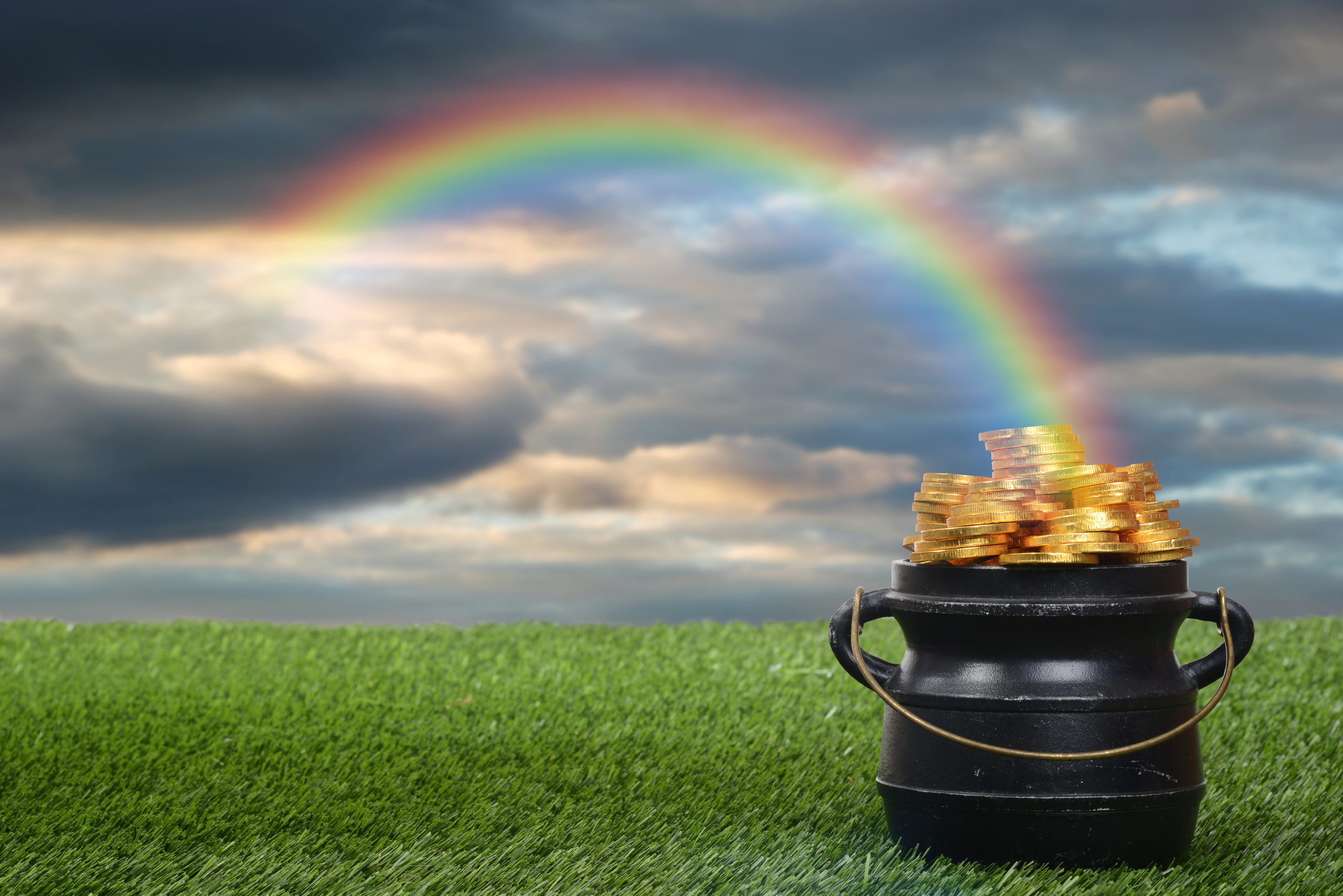 closeup pot of gold with rainbow